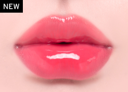 ProtoClinical k-beauty Oddtype Unseen Balloon Tint bright pink lip tint swatch centered on a pale pink background with soft green corner accents