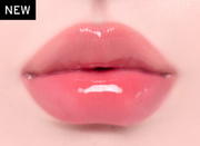 ProtoClinical k-beauty Oddtype Unseen Balloon Tint bright pink lip tint swatch centered on a pale pink background with soft green corner accents