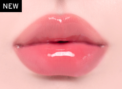 ProtoClinical k-beauty Oddtype Unseen Balloon Tint bright pink lip tint swatch centered on a pale pink background with soft green corner accents