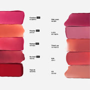 ProtoClinical k-beauty Oddtype Unseen Mirror Tint two upright coral lip tint tubes side by side on a pale aqua and blush background
