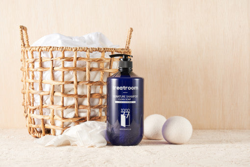 ProtoClinical k-beauty treatroom Signature Shampoo 1077ml #CLEAN SOAP single tall blue shampoo bottle centered on a white background.