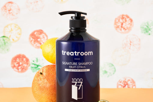 ProtoClinical k-beauty treatroom Signature Shampoo 1077ml #FRUIT CITRUS single tall blue shampoo bottle centered on a white background.