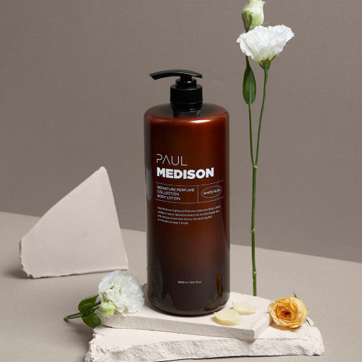 ProtoClinical k-beauty PAUL MEDISON Signature Perfume Collection Body Lotion 1600ml #White Musk in a tall dark brown bottle standing upright on a beige background