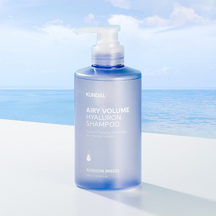 ProtoClinical k-beauty KUNDAL AIRY VOLUME HYALURON SHAMPOO 500ml #BLOSSOM BREEZE single upright shampoo bottle centered on a light background.