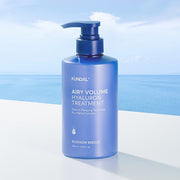 ProtoClinical k-beauty KUNDAL AIRY VOLUME HYALURON TREATMENT 500ml #BLOSSOM BREEZE blue bottle silhouette centered on a white background with pale aqua side shading