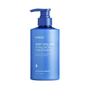 ProtoClinical k-beauty KUNDAL AIRY VOLUME HYALURON TREATMENT 500ml #BLOSSOM BREEZE tall blue bottle silhouette centered on a white background with pale aqua side shading