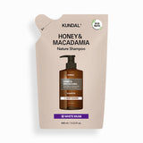 ProtoClinical k-beauty KUNDAL HONEY & MACADAMIA Pure Natural Balancing Refreshing Shampoo 500ml #WHITE MUSK single upright shampoo bottle centered on a light background.