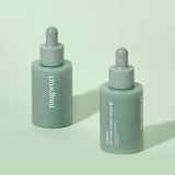 ProtoClinical k-beauty KUNDAL Mugwort Soothing Energy Serum 30ml two deep green serum bottles side by side on a pale sage background