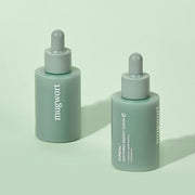 ProtoClinical k-beauty KUNDAL Mugwort Soothing Energy Serum 30ml two deep green serum bottles side by side on a pale sage background