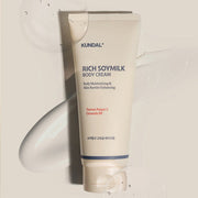 ProtoClinical k-beauty KUNDAL RICH SOYMILK BODY CREAM 200ml #Mellow Vanilla soft beige body cream bottle silhouette on a light cream background.