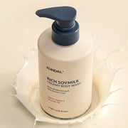 ProtoClinical k-beauty KUNDAL RICH SOYMILK BODY CREAM 500ml #Mellow Vanilla tall beige body cream bottle with soft blue side accents on a white background.