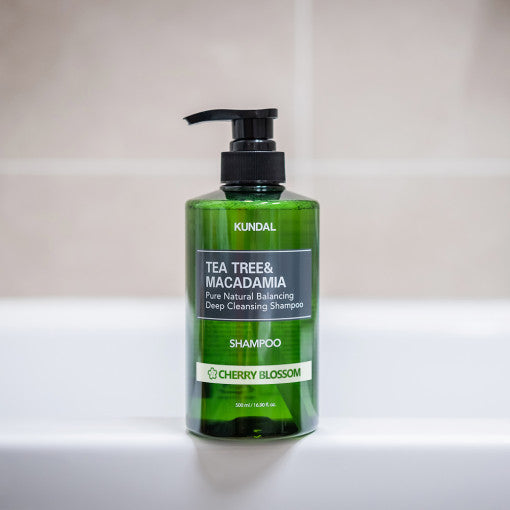ProtoClinical k-beauty tall green skincare product centered on a pale lavender and white background.