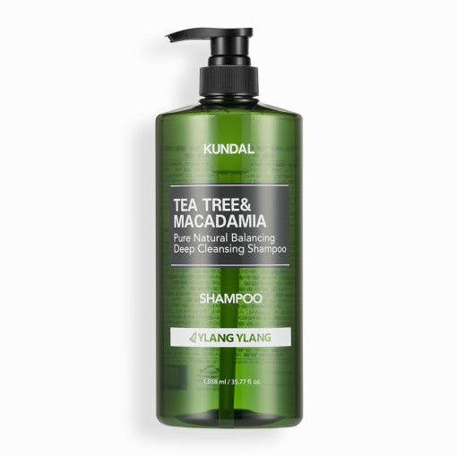ProtoClinical k-beauty KUNDAL Tea Tree & Macadamia Deep Cleansing Shampoo 1058ml #YLANG YLANG single upright dark green shampoo bottle centered on a light background.