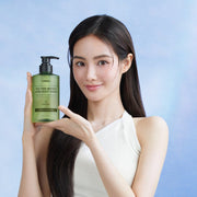 ProtoClinical k-beauty KUNDAL Tee Tree Bioticts Acne Body Wash 500ml #Apple Green Tea single centered warm brown body wash bottle on a light blue and white background.