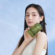 ProtoClinical k-beauty KUNDAL Tee Tree Bioticts Acne Body Wash 500ml #Apple Green Tea single centered warm brown body wash bottle on a light blue and white background.