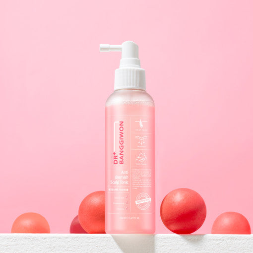 ProtoClinical k-beauty Dr.BANGGIWON Anti Blemish Scalp Tonic 150ml single pink scalp tonic package centered on a soft pink background.