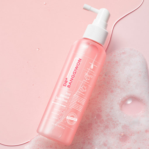 ProtoClinical k-beauty Dr.BANGGIWON Anti Blemish Scalp Tonic 150ml single upright pink scalp tonic bottle on a soft pink and gray background.