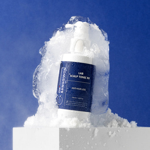 ProtoClinical k-beauty deep blue beauty graphic with a soft white highlight above a muted olive base.