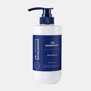ProtoClinical k-beauty Dr.BANGGIWON LAB SHAMPOO RX 480ml single upright dark blue shampoo bottle centered on a soft white background.