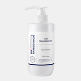 ProtoClinical k-beauty Dr.BANGGIWON LAB TREATMENT RX 480ml white pump bottle with cream spill on a vivid blue background and white pedestal