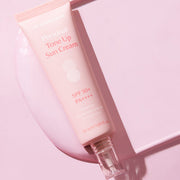 ProtoClinical k-beauty DR.BANGGIWON Personal Tone Up Sun Cream #01 Rosy 50ml SPF50+ PA++++ single rosy pink sun cream package centered vertically on a pale pink background.