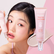 ProtoClinical k-beauty DR.BANGGIWON Personal Tone Up Sun Cream #01 Rosy 50ml SPF50+ PA++++ close-up model portrait with dark hair on a pink background.