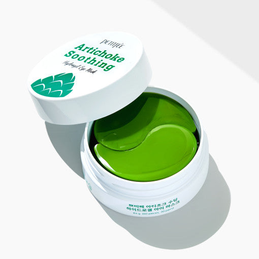 ProtoClinical k-beauty PETITFEE Artichoke Soothing Hydrogel Eye Mask 80g (60 Patches) green round eye mask jar centered on a light background with soft pink side accents