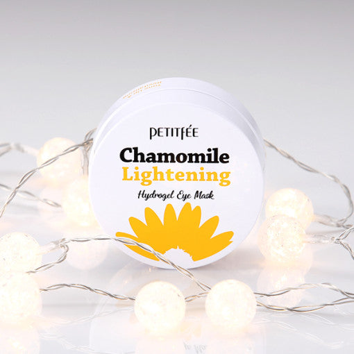 ProtoClinical k-beauty PETITFEE Chamomile Lightening Hydrogel Eye Mask 80g (60 Patches) single centered eye mask package with a warm beige middle band on a light background