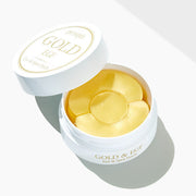 ProtoClinical k-beauty PETITFEE GOLD EGF EYE & SPOT PATCH (EYE patch 1.1g X 60 Patches + SPOT patch 0.6g X 30 Patches) single warm yellow eye patch package laid horizontally on a pale blue and cream background