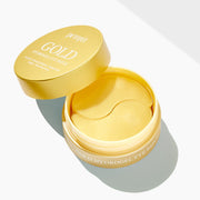 ProtoClinical k-beauty PETITFEE Gold Hydrogel Eye Patch (1.4g X 60 Patches) two golden yellow crescent eye patches mirrored at the center on a pale blue background