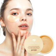 ProtoClinical k-beauty PETITFEE Gold Snail Hydrogel Eye Patch (1.4g X 60 Patches) single beige vertical package on a light background with pale aqua side shading and an olive accent at the lower right