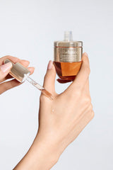 ProtoClinical k-beauty Sulwhasoo Concentrated Ginseng Rejuvenating Ampoule 20g detail image with warm beige and pale blue tones on a light background.