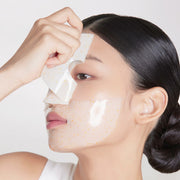 ProtoClinical k-beauty warm beige and charcoal beauty product image on a light background.