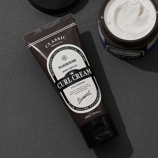 ProtoClinical k-beauty BARBER501 BEER METTO VOLUMIZING CURL CREAM 100ml single dark bottle centered on a black background with a bright white base