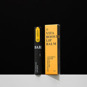 ProtoClinical k-beauty BARBER501 Vita Booster Lip Balm 3.6ml product packaging on a light background.
