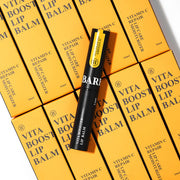 ProtoClinical k-beauty BARBER501 Vita Booster Lip Balm 3.6ml product packaging on a light background.