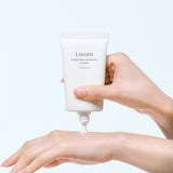 ProtoClinical k-beauty pastel blue and peach beauty product detail on a light background.
