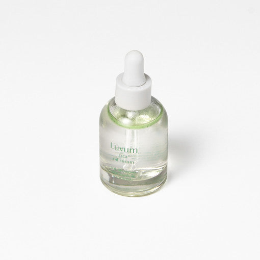 ProtoClinical k-beauty Luvum Calming Repair Cica Oil Serum 30ml pale green and beige product packaging with a centered silhouette on a light background