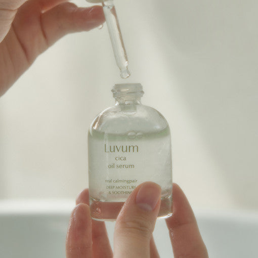 ProtoClinical k-beauty Luvum Calming Repair Cica Oil Serum 30ml pale green and beige product packaging with a centered silhouette on a light background