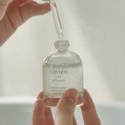 ProtoClinical k-beauty Luvum Calming Repair Cica Oil Serum 30ml pale green and beige product packaging with a centered silhouette on a light background