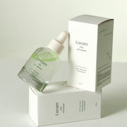 ProtoClinical k-beauty Luvum Calming Repair Cica Oil Serum 30ml abstract product graphic with three pale green vertical silhouettes and beige lower tones on a light background