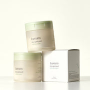 ProtoClinical k-beauty olive and beige beauty product packaging on a light background.