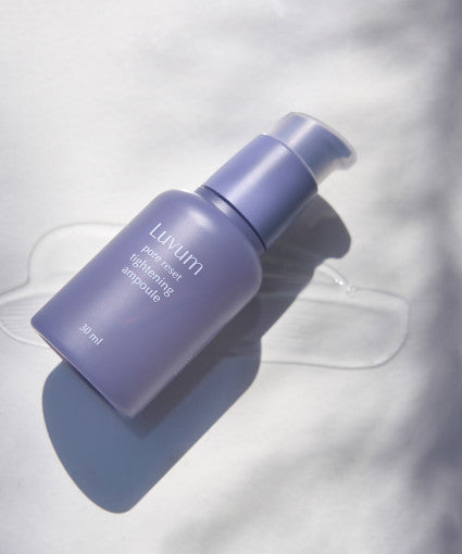 ProtoClinical k-beauty product packaging on a light background.