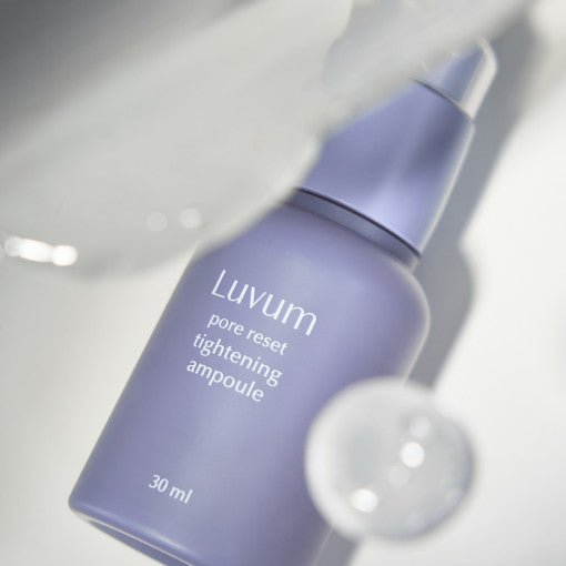 ProtoClinical k-beauty skincare product packaging in pale blue tones on a light background.