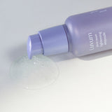 ProtoClinical k-beauty blue skincare product packaging on a light background.