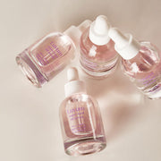 ProtoClinical k-beauty Luvum Slow Aging Super Food Oil Serum 30ml in a soft green and pink product set on a light background