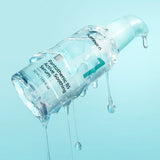 ProtoClinical k-beauty soft aqua beauty graphic with a muted teal center on a light background.