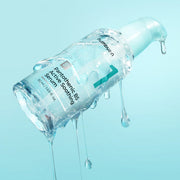 ProtoClinical k-beauty soft aqua beauty graphic with a muted teal center on a light background.