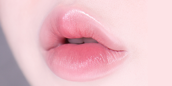 ProtoClinical k-beauty TONYMOLY Easy Touch Auto Lip Liner deeper rose oval lip liner swatch with cool gray side shading on a pale background
