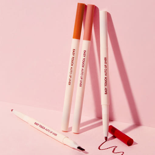 ProtoClinical k-beauty TONYMOLY Easy Touch Auto Lip Liner soft peach vertical lip liner swatch with a warm brown center band on a light background